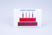 Load image into Gallery viewer, A birthday cake with 4 lit candles &amp; greeting on top