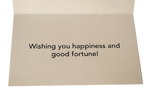 inside of card reads " wishing you happiness and good fortune!" in large print and Braille.