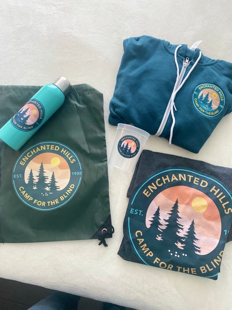 Collection of EHC merchandise, all with new EHC logo. Collection includes a water bottle, lite weight sports sack, t-shirt, hoodie, and clear plastic cup.