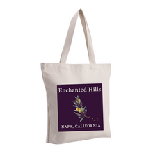 Load image into Gallery viewer, Beige canvas tote with EHN logo.