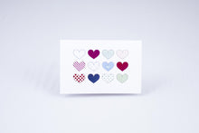 Load image into Gallery viewer, Multi-heart card, 12 different hearts arranged in a 4x3 grid, with different colors and textures on each.