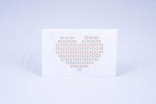 Load image into Gallery viewer, Card displaying a heart made out of Braille X&#39;s and O&#39;s