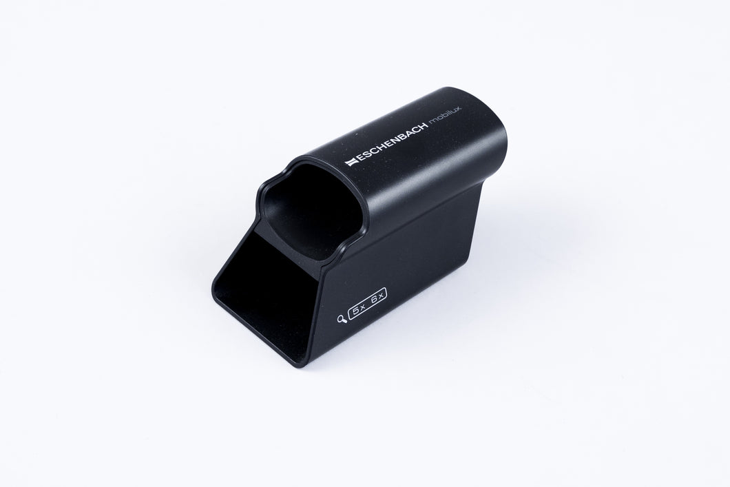 Eschenbach Mobase Stand. A Black elevated sleeve which holds the magnifier at the appropriate height.