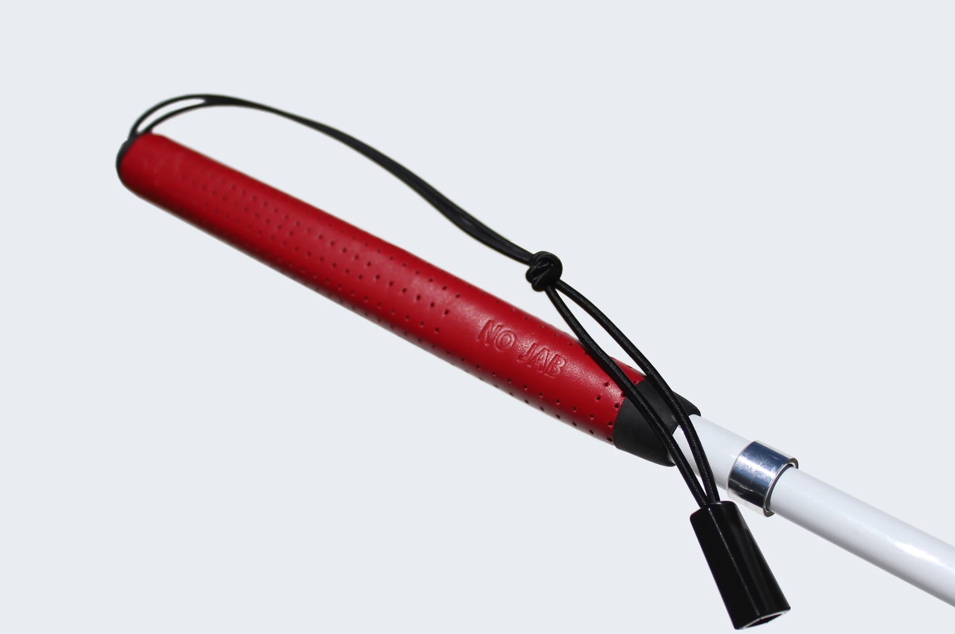close-up of handle, leather golf grip, with the word "no-jab" written on the handle.