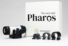 Load image into Gallery viewer, Pharos Cane Light shown with packaging and several different-diameter cane attachment